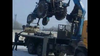 Погрузка трактора МТЗ-82 манипулятором на Камаз Погрузка трактора МТЗ-82 манипулятором на Камаз