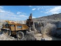 Rock and water! Cat 374 F LME toploading 772 G's! Outside and incab view, pure sound!!