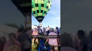 Balloon Goes Through Crowd