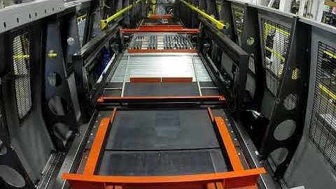 Columbia Machine: HL9200 High Speed Palletizer Stacking Trays of Unwrapped Cans