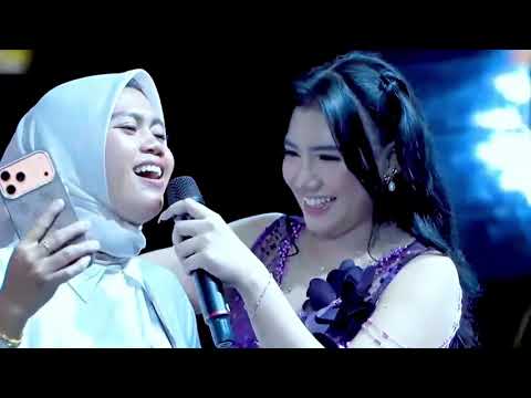 Lusyana Jelita - sebotol minuman