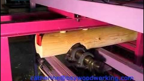Log home cabin machines -log_notcher.flv
