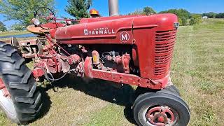 Farmall M Mowing with a New Idea 290 Haybine