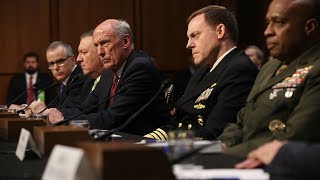 National security officials dodge questions on conversations with Trump