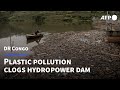 Plastic pollution clogs hydropower dam in DR Congo | AFP