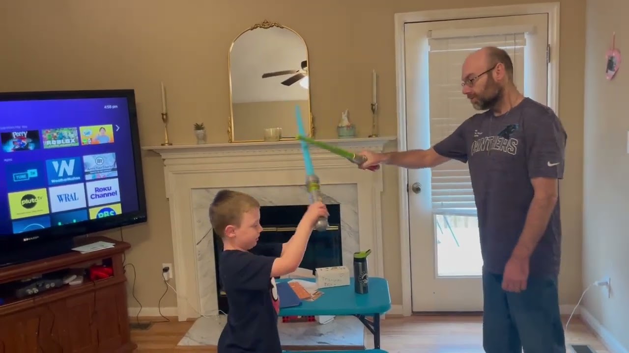 Father vs Son: Lightsaber Battle – Who Will Win the Showdown?