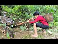 The boy used a crossbow to hunt frogs in the stream lucky to shoot many big frogs wandering boy