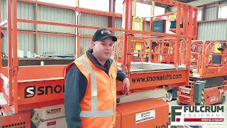 Why does the Snorkel Scissor Lift stop and alarm when the platform is coming down?