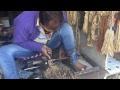 Hand crafting Tulsi Beads