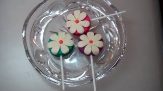 Play-doh flower lollipops