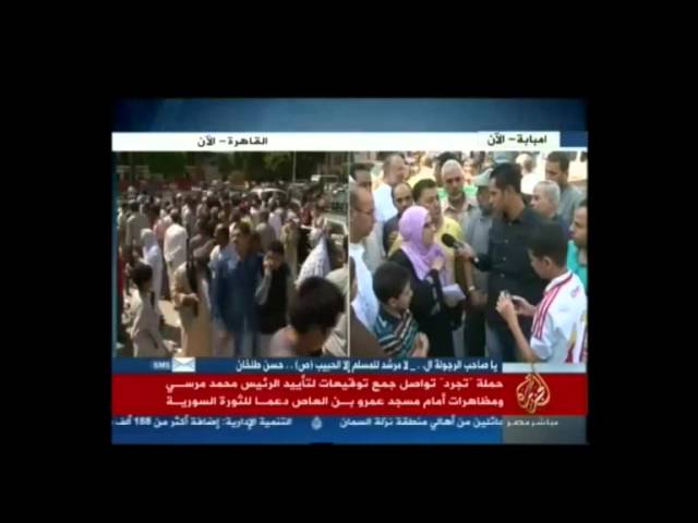 حملة "تجرد" تواصل جمع توقيعات لتأييد الرئيس محمد مرسي
