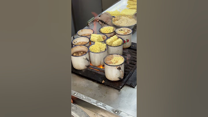 河南信阳特色茶缸面，11元一份，这种吃法你们见过吗？ #抖音美食推荐官 #路边摊美味 #在路边摊感受人间烟火 #信阳美食 #茶缸面
