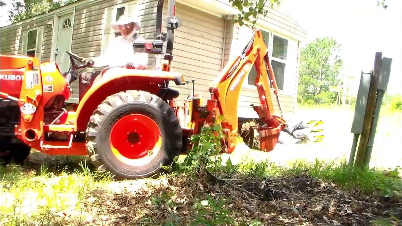 Kubota backhoe Digging trench for sewer line YouTube