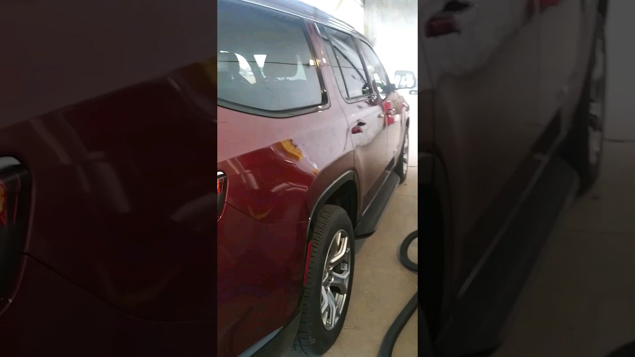 The wagoneer/ 8 seater. I like this red! @ Very comfortable ride!