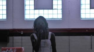 Shae singing for school talent show