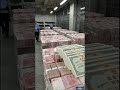 Billions of Yuan Renminbi currency banknotes.