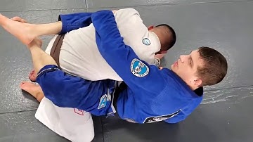 Closed Guard - Pendulum Sweep Position - Rolling Belly Down Armbar