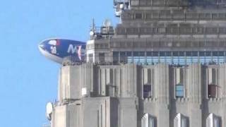 Hello Snoopy! Met Life Blimp Flirts With The Empire State Building