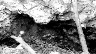 US soldiers around shaft lead to underground Japanese installation on Hill 153 in...HD Stock Footage