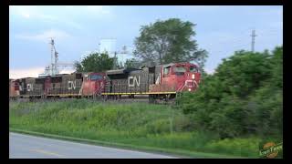 Chasing a CN mixed freight on my bike, and some close up UP autorack family time!