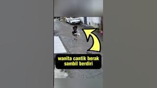 Beautiful woman standing in the middle of the street