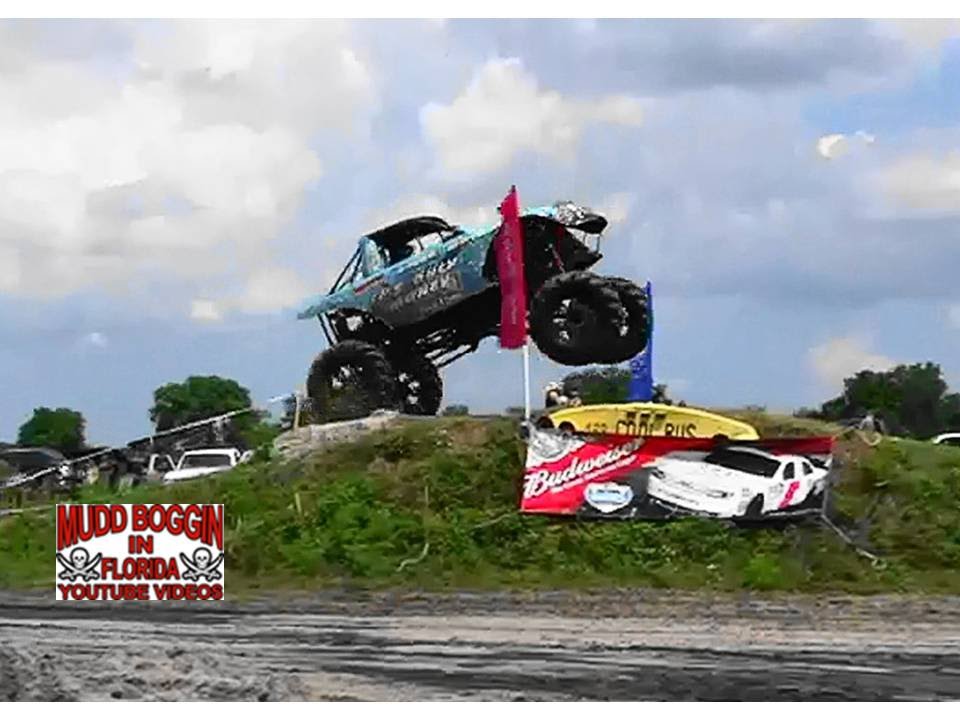 mud racing cars It's Only Money Mega Truck In Obstacle Coarse Race..