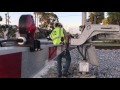 Railroad crossing gate repair after someone hit the gate