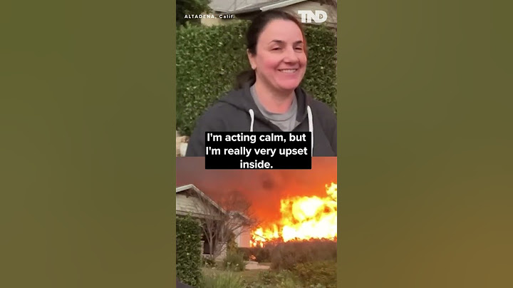 Homeowner watches as California fire rips through her neighbors home