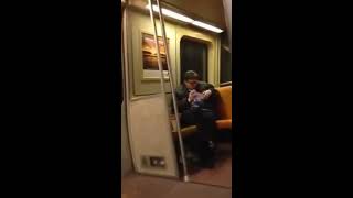 Drunk man on train sings Get Low by Lil jon Resimi