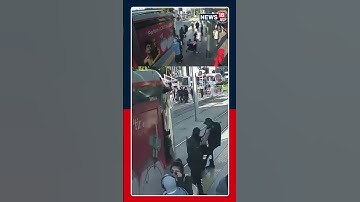 Dramatic Footage Shows Security guard pulling woman from path of oncoming tram | #shorts