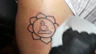 Buddha Tattoo made with Lotus mandala design; simple, but peaceful Tattoo