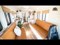 Family Of 4 & Their DIY Raised Roof School Bus Tiny House