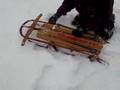 Sledding in fresh deep snow Sledding in fresh deep snow