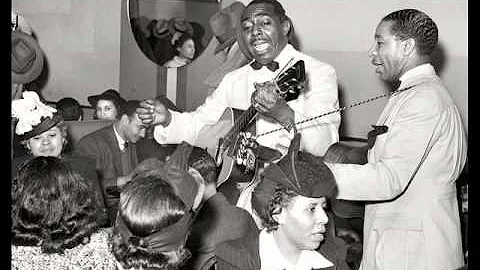 Lonnie Johnson - Woke Up With The Blues In My Fing...