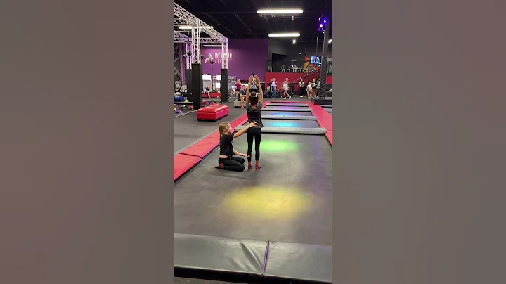 Brooklyn helps Zoe do a back handspring 2/30/22