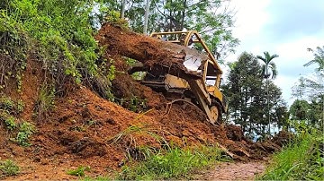 The CAT D6R Dozer Operator Doing an Excellent Job On Constructing Plantations Road