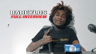 Babeylos Crashes Out Pulls Gun On Interview, Speaks on Island Boys Kissing, Kodak Black and 6ix9ine