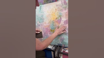 Sanding layers of mixed media collage #mixedmediaart