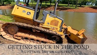 Got the dozer stuck trying to clean up the edges of the pond