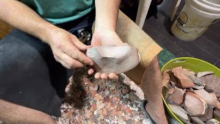 Removing cortex from spalled Heat treated Buffalo River Chert.