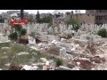 سقوط برميل متفجر على مقبرة