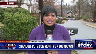 Standoff puts community on lockdown