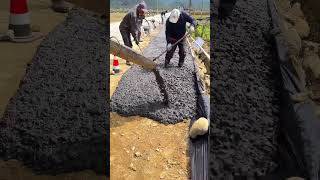 The process of pouring concrete on the ground, road construction
