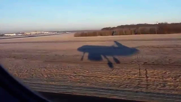 A319 casting a funny shadow (on-board footage)