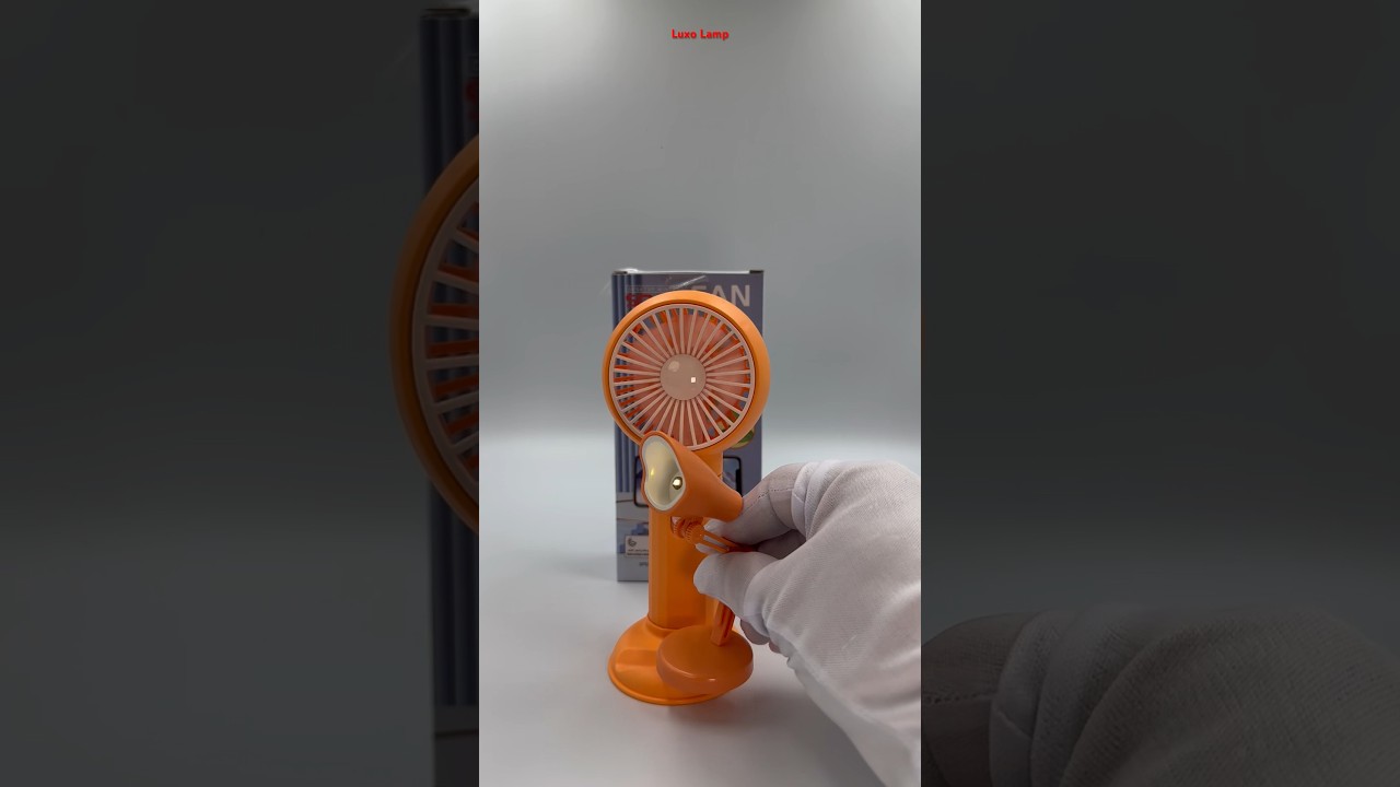 Mini Fan vs Orange Luxo Lamp 