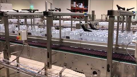 Intervention on inlet conveyors of a shrink-wrapping machine