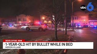 1-year-old struck by bullet while sleeping in bed