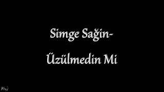 Simge - Üzülmedin Mi Lyrics