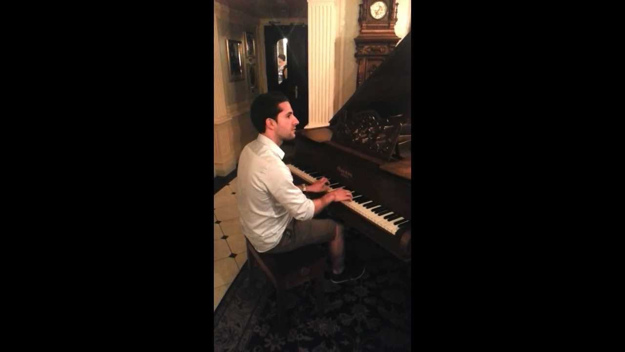 Acheron plays the piano in Walt's Restaurant (Disneyland Paris)