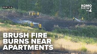 Brush fire breaks out between Renton condos, apartments